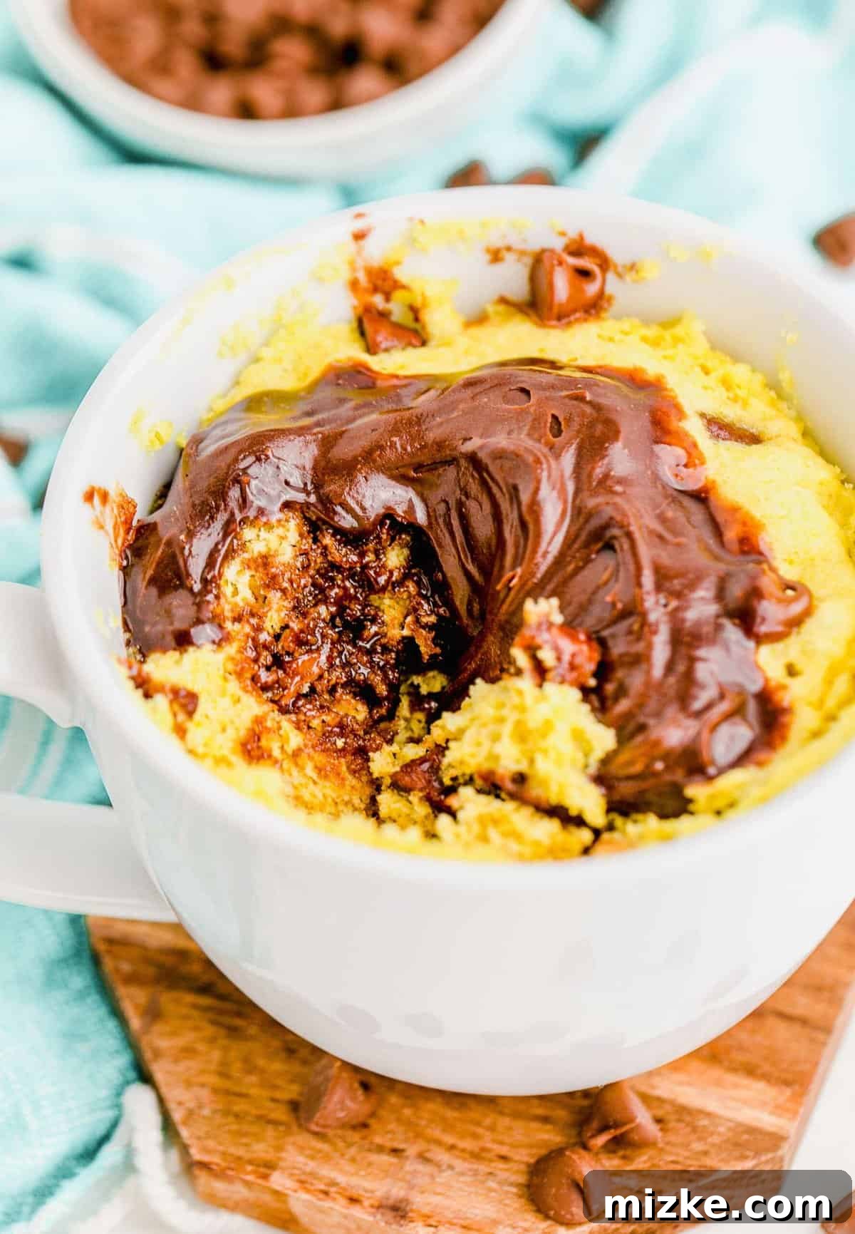 Instant Chocolate Chip Mug Treat 4 Chocolate chip mug cake generously topped with melted chocolate syrup