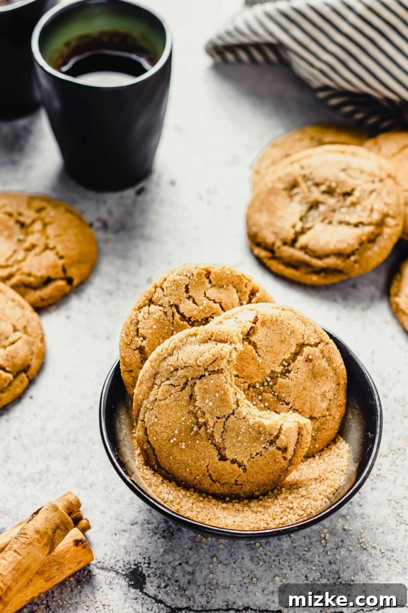 Warm Cinnamon Brown Sugar Delights 6 A few cookies are placed in a small black bowl with turbinado sugar.
