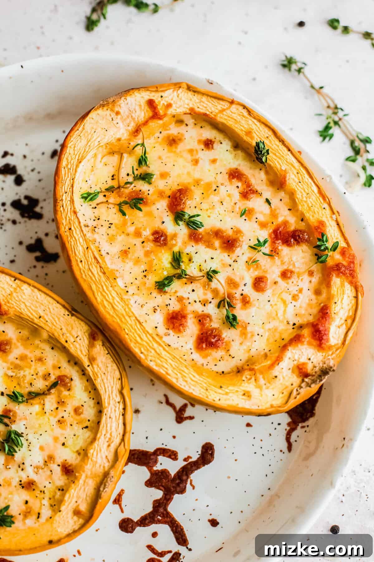 Overhead view of cheesy pesto spaghetti squash