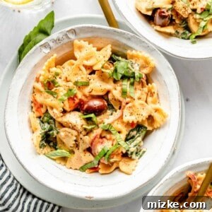 Boursin Cheese Pasta in a serving bowl with a spoon