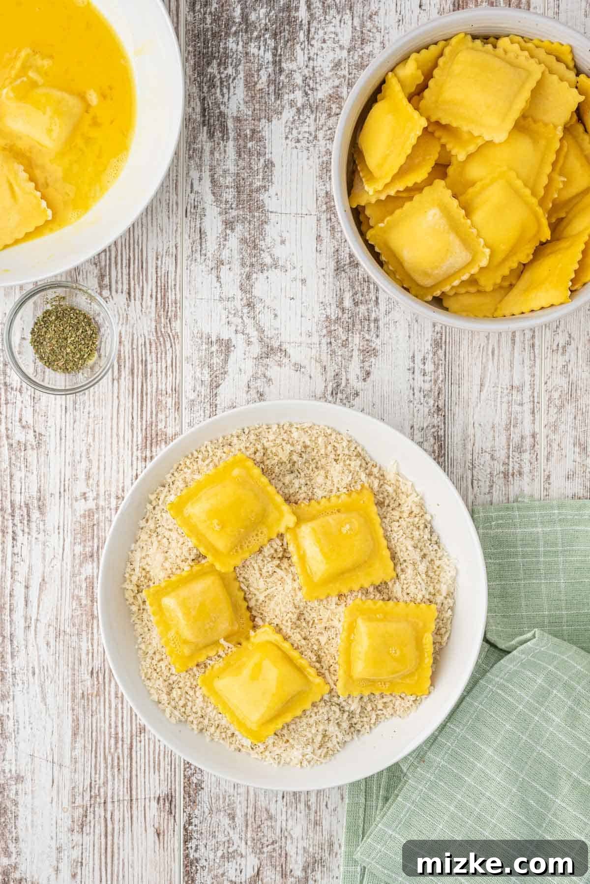 Egg washed ravioli covered with panko breadcrumb mixture