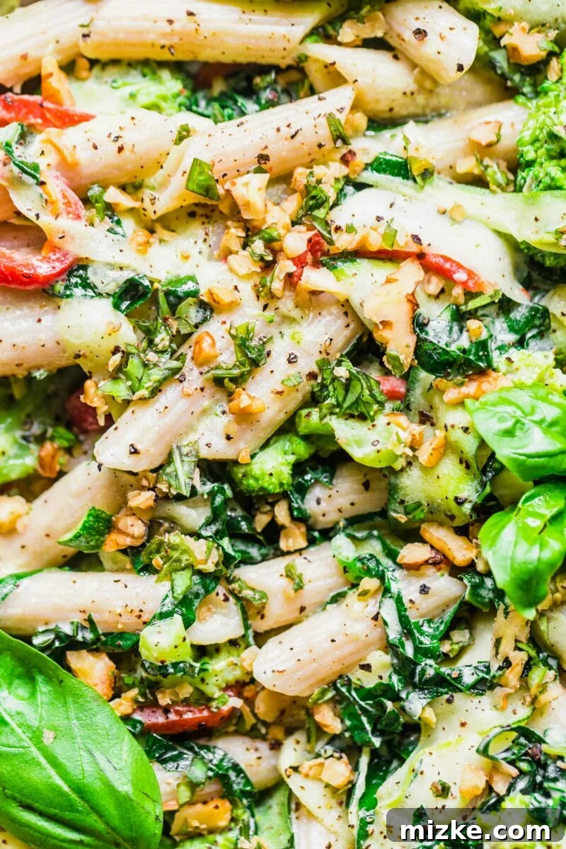 Velvet Cashew Basil Vegan Pasta 7 Freshly made creamy vegan basil cashew pasta and sautéed vegetables are generously topped with a large amount of freshly ground black pepper for extra flavor and texture.