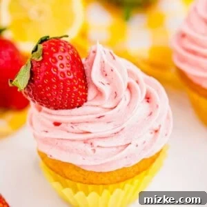 Strawberry lemonade cupcake topped with fresh strawberry