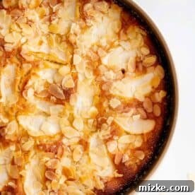 baked apple almond cake in the baking pan