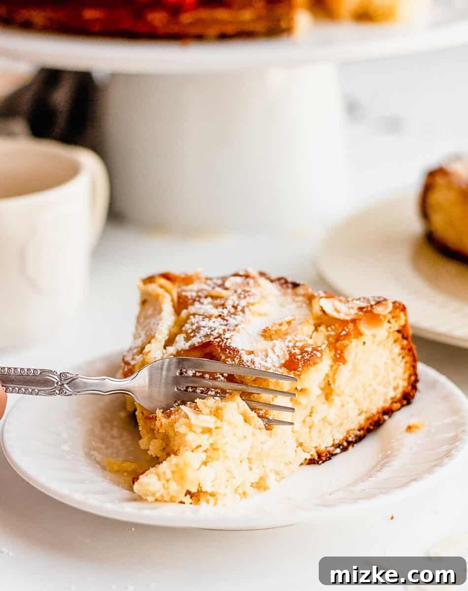 Apple almond cake on a wooden board
