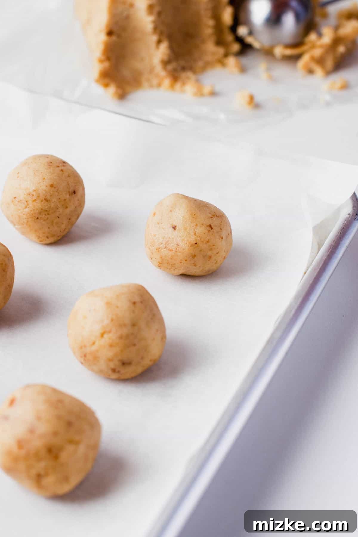 Melt-in-Your-Mouth Snowballs 8 raw snowball cookie dough rolled into a ball pre-baking
