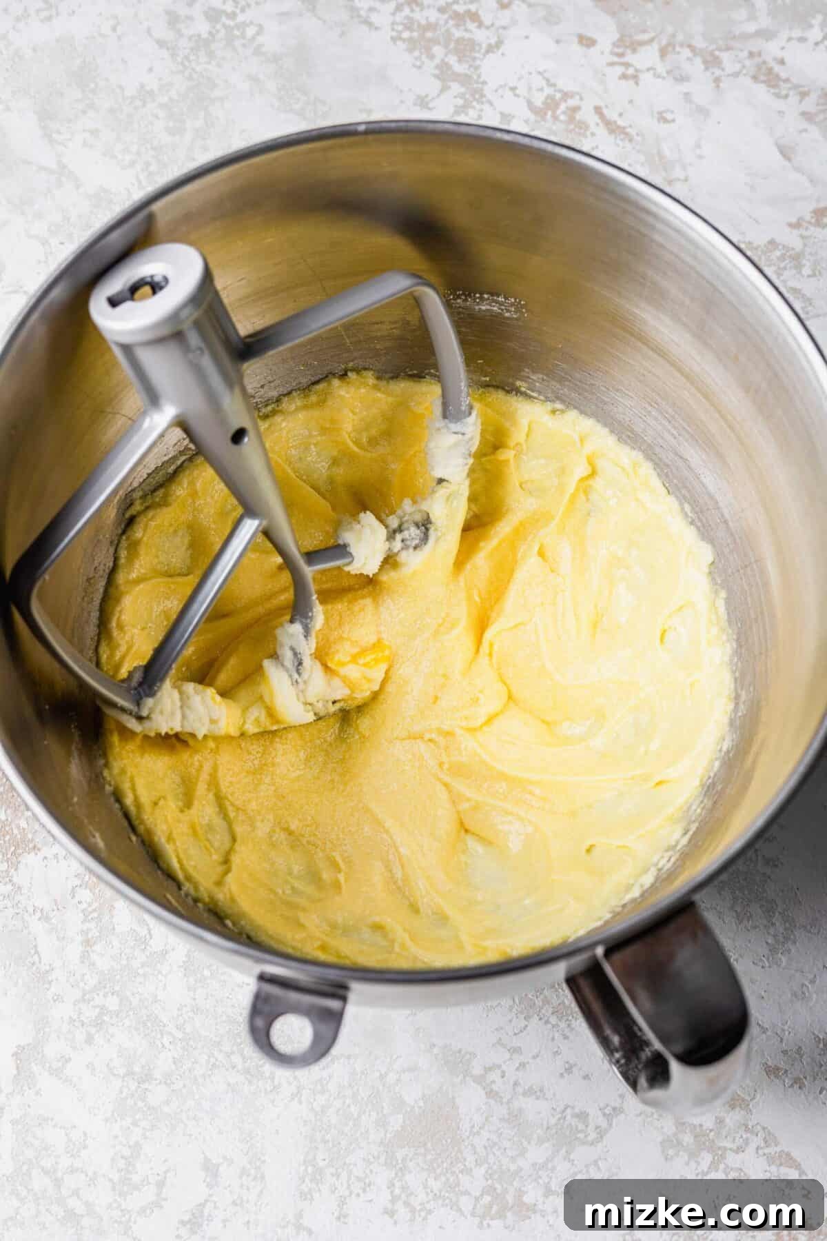 These chocolate peppermint lofthouse cookies are moist, decadent, and bursting with flavor, making them the perfect Christmas cookie. Beaten butter, sugar, and eggs in a mixing bowl, with a stand mixer paddle attachment in the bowl