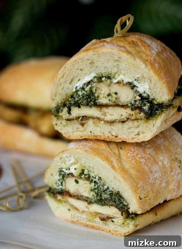 Goat Cheese Pesto Chicken Sandwich from www.tablefortwoblog.com Close-up of a delicious Goat Cheese Pesto Chicken Sandwich, highlighting the vibrant colors and creamy textures.