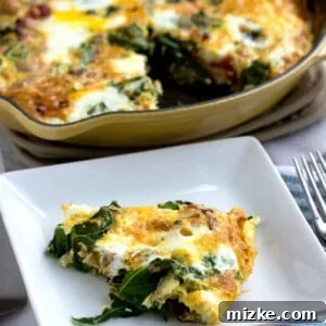 A slice of turkey and vegetable frittata on a square plate, next to a full frittata in a cast iron skillet.