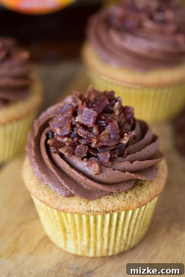 Maple Bacon Cupcakes from www.tablefortwoblog.com Maple Bacon Cupcakes arranged beautifully on a serving tray