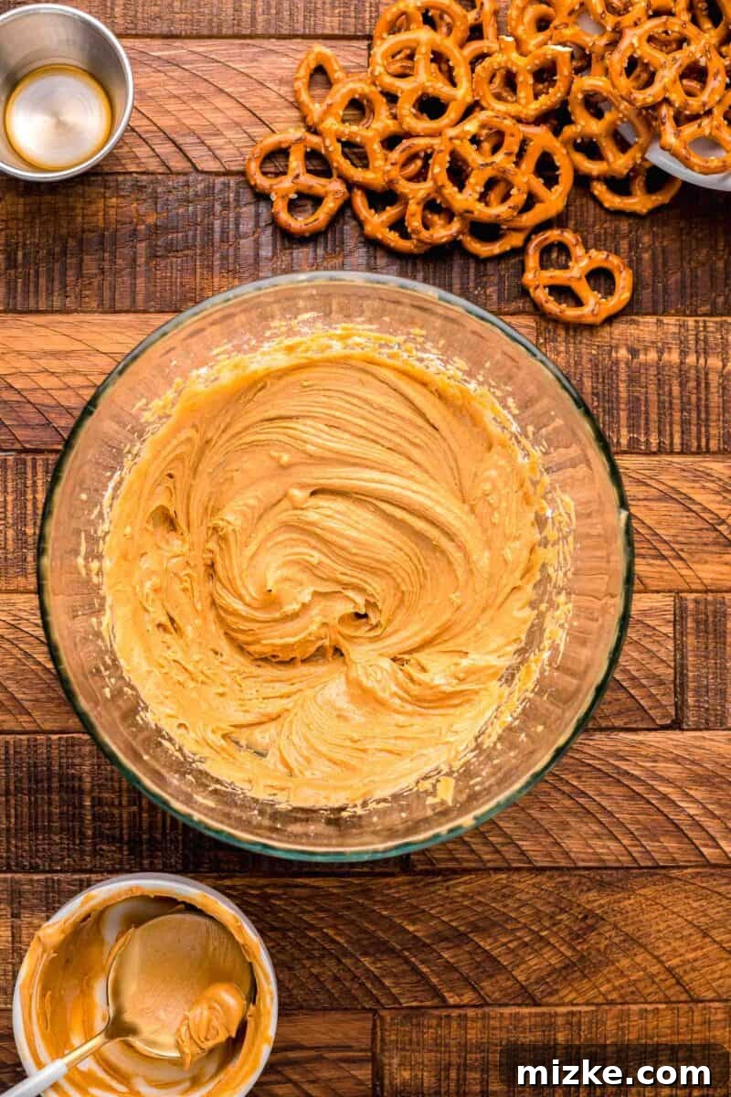 All ingredients thoroughly mixed together in the peanut butter mixture, creating a smooth and delicious filling