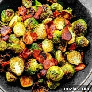 Crispy bacon and roasted brussels sprouts in a black ceramic bowl, featured in the recipe card.