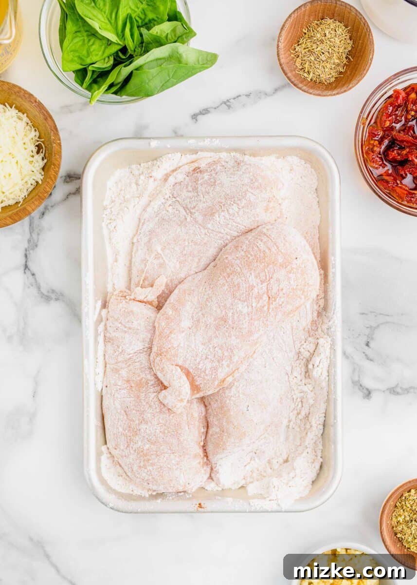 Yes-I-Will Chicken 5 Chicken breasts coated in flour mixture next to bowls of Parmesan, basil, thyme, sun-dried tomatoes, garlic, and oregano