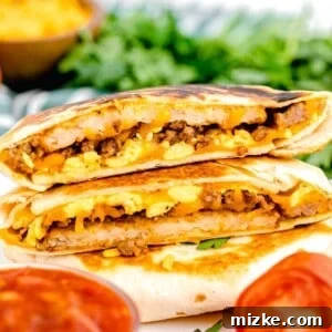 A stack of golden breakfast crunchwraps is invitingly placed next to a small dish of vibrant salsa, ready to be enjoyed.