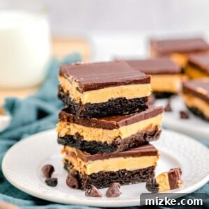 Buckeye Bliss Brownies 14 three brownies are stacked on a white plate