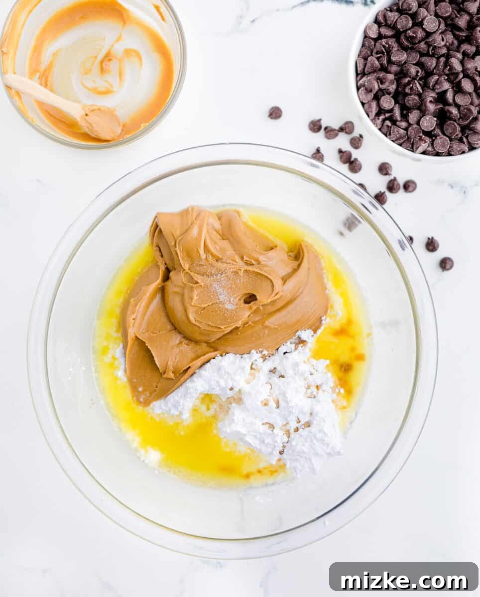 Buckeye Bliss Brownies 6 butter, powdered sugar and peanut butter are presented in a glass bowl