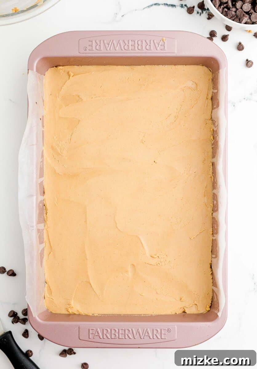 Buckeye Bliss Brownies 10 a peanut butter layer is presented in a large pan