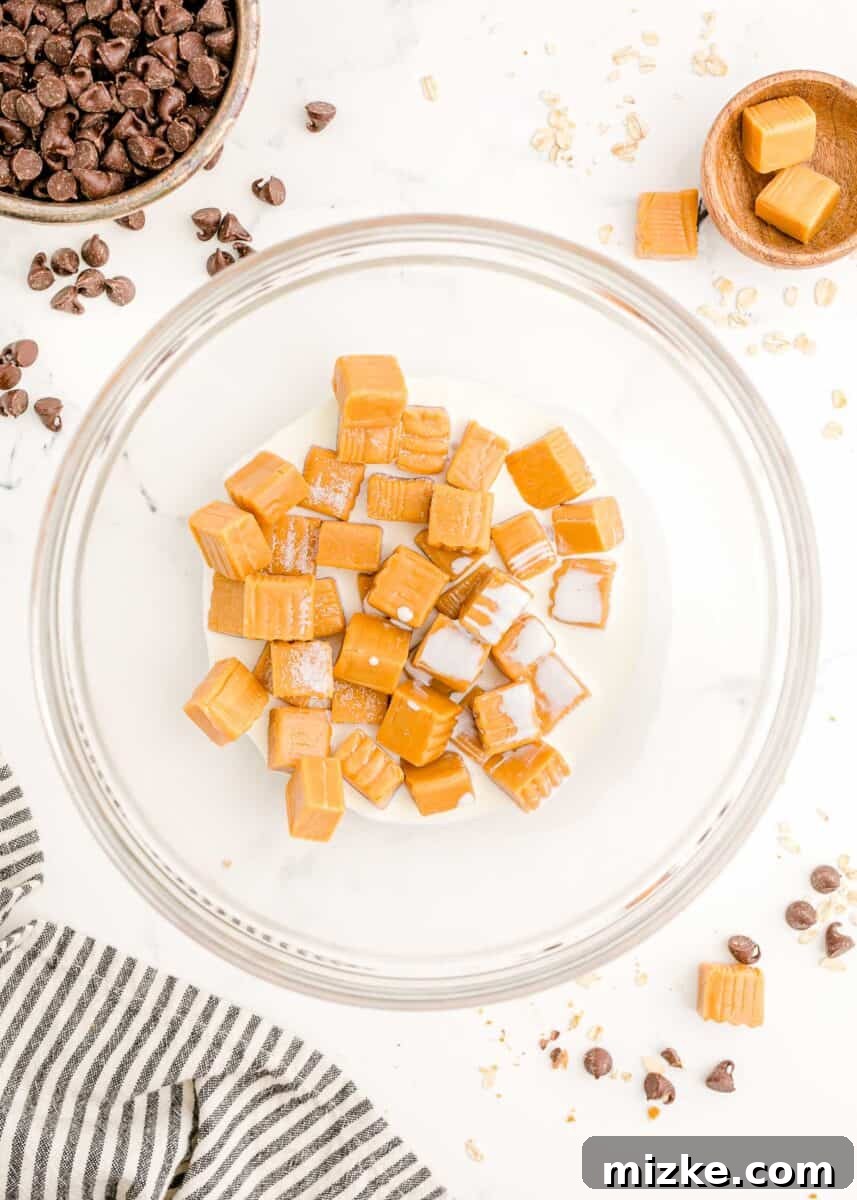 The Carmelitas Legacy 6 Unwrapped caramel squares are placed in a large glass bowl, ready to be melted with heavy cream.