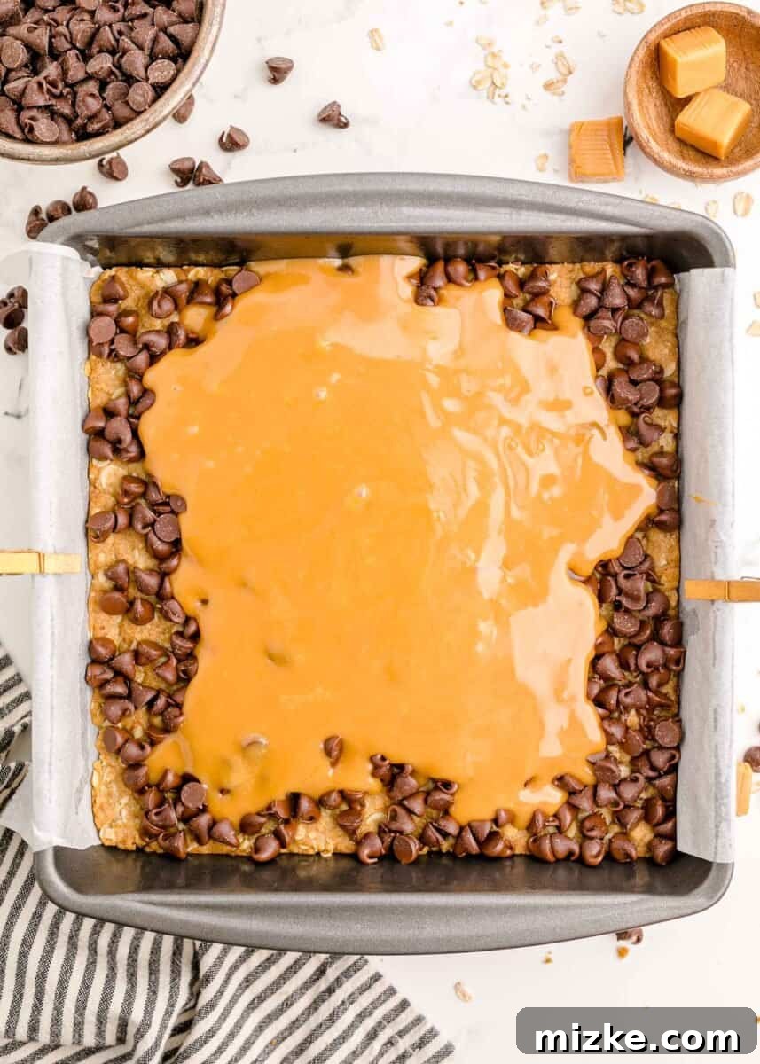 The Carmelitas Legacy 9 The molten caramel sauce completely covers the chocolate chips, creating a smooth and even layer over the crust.