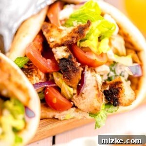 veggies and chicken fill a gyro.