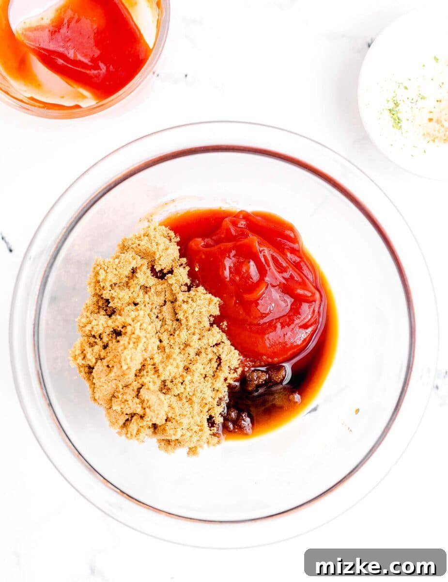 Perfect Instant Pot Meatloaf 8 All the ingredients for the meatloaf glaze – including ketchup, brown sugar, and Worcestershire sauce – are meticulously arranged in a small glass bowl, primed for mixing.