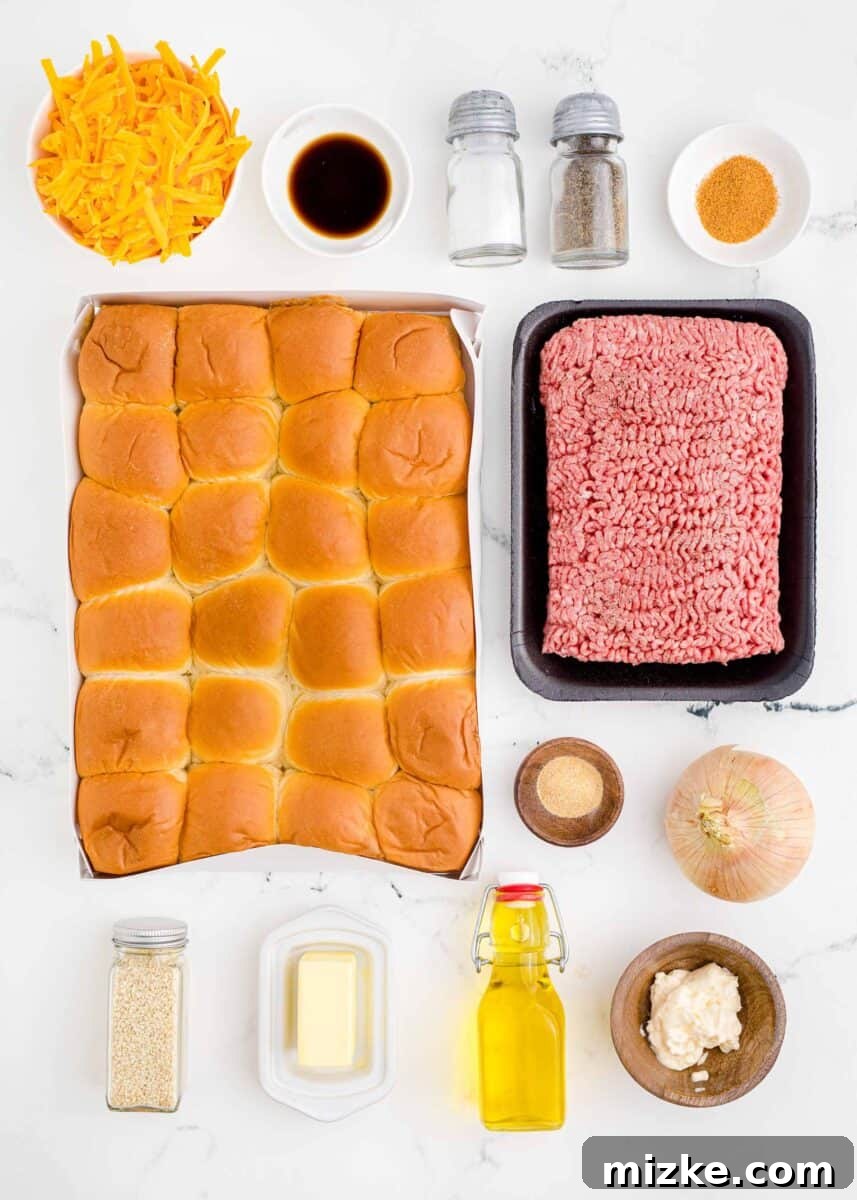 Pint-Sized Patty Perfection 3 All the fresh ingredients for homemade cheeseburger sliders are neatly arranged on a kitchen countertop, ready for assembly.