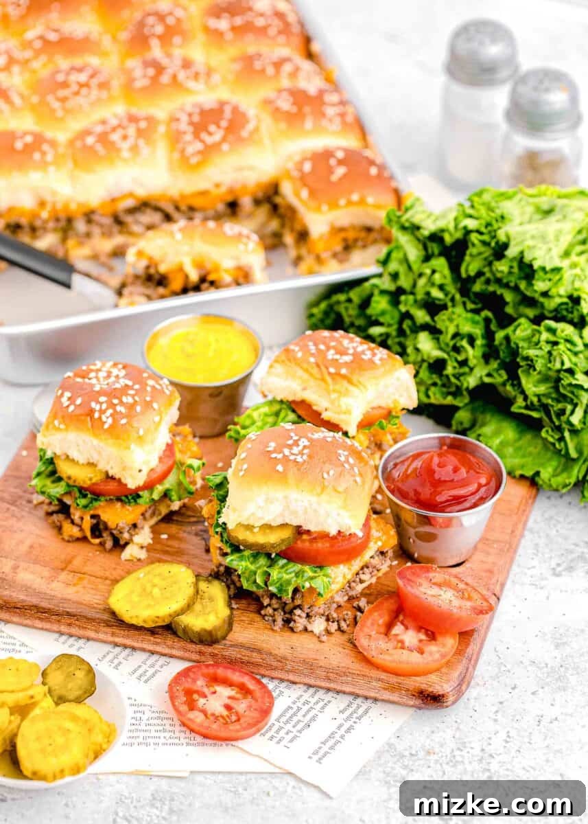 Pint-Sized Patty Perfection 10 A collection of freshly baked cheeseburger sliders neatly arranged on a wooden cutting board, ready to be served.
