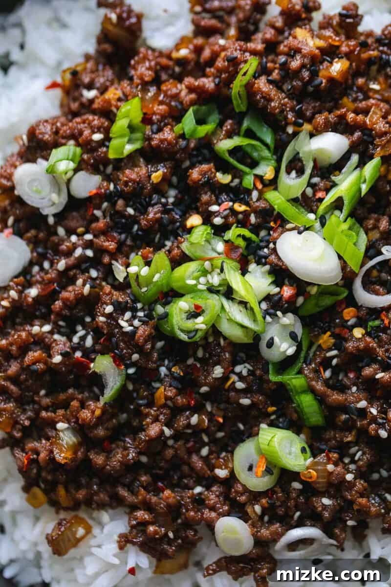 Sizzling Korean Beef Delights 4 A vibrant bowl of Korean Ground Beef mixed with the glossy, rich sauce, ready to be served, highlighting its appealing texture and deep color.