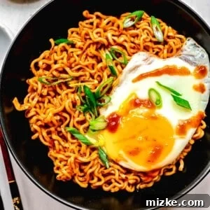 Buldak ramen served in a bowl with an egg, highlighting its spicy appeal.
