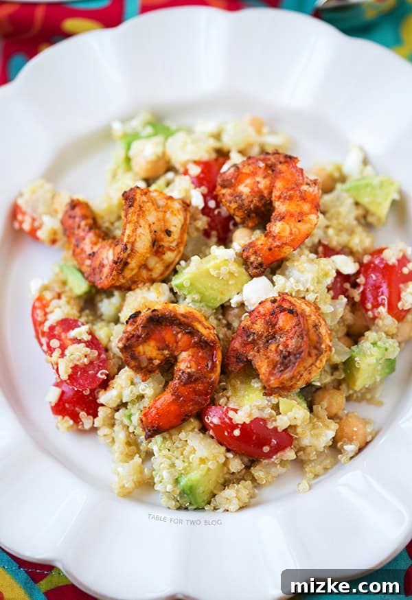 Spicy Grilled Shrimp with Quinoa Salad | tablefortwoblog.com A complete serving of Spicy Grilled Shrimp with Quinoa Salad, plated beautifully.