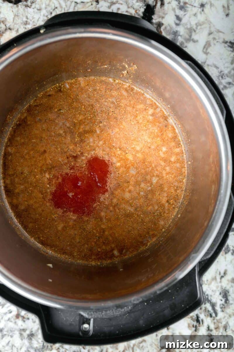 tomato sauce added into the insert of the instant pot