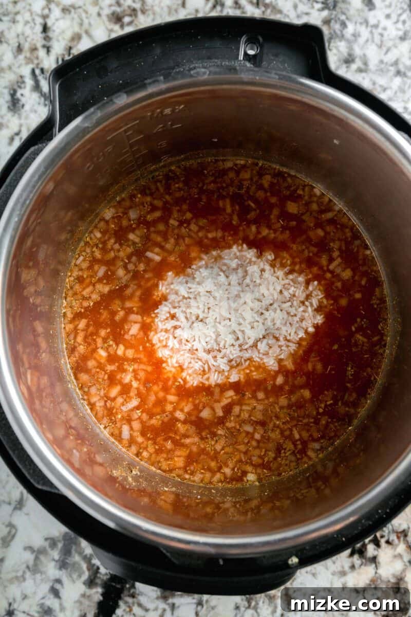 long grain white rice added to the insert of the instant pot