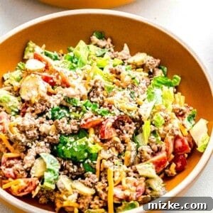 Big Mac salad served in 2 bowls.