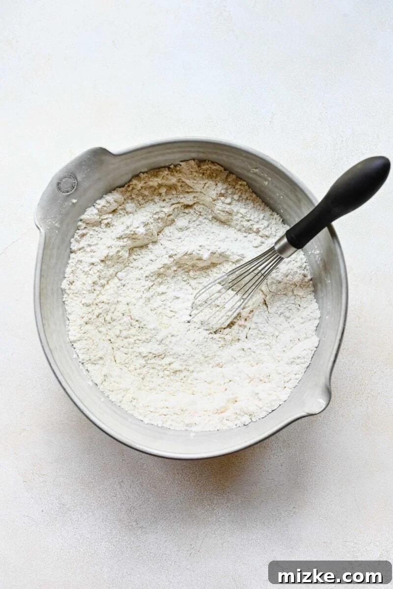 Mixing dry ingredients for bao bun dough