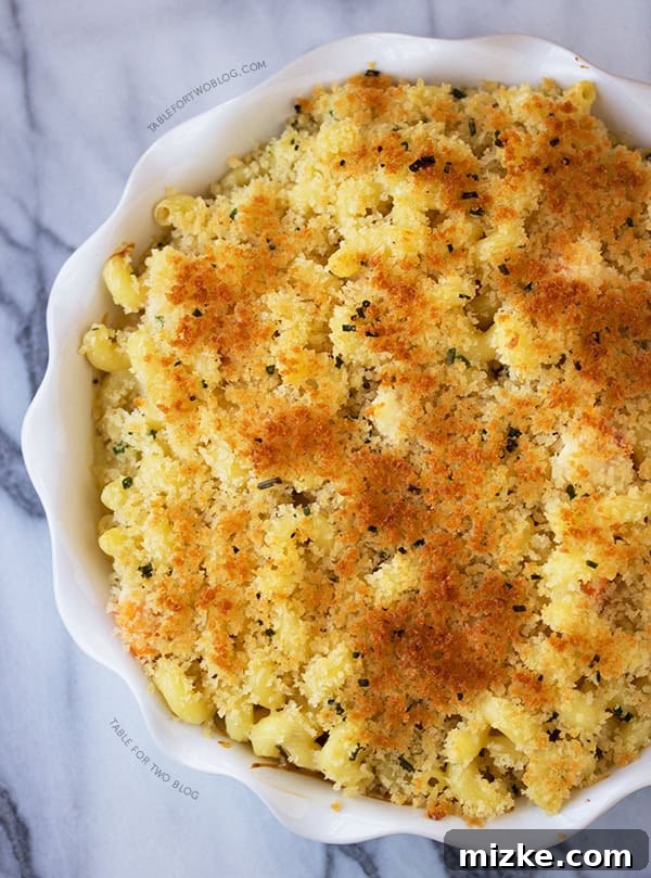 Homemade Lobster & Shrimp Mac n Cheese | Comfort Food Recipe A large serving of homemade Lobster and Shrimp Mac n Cheese, ready to be enjoyed