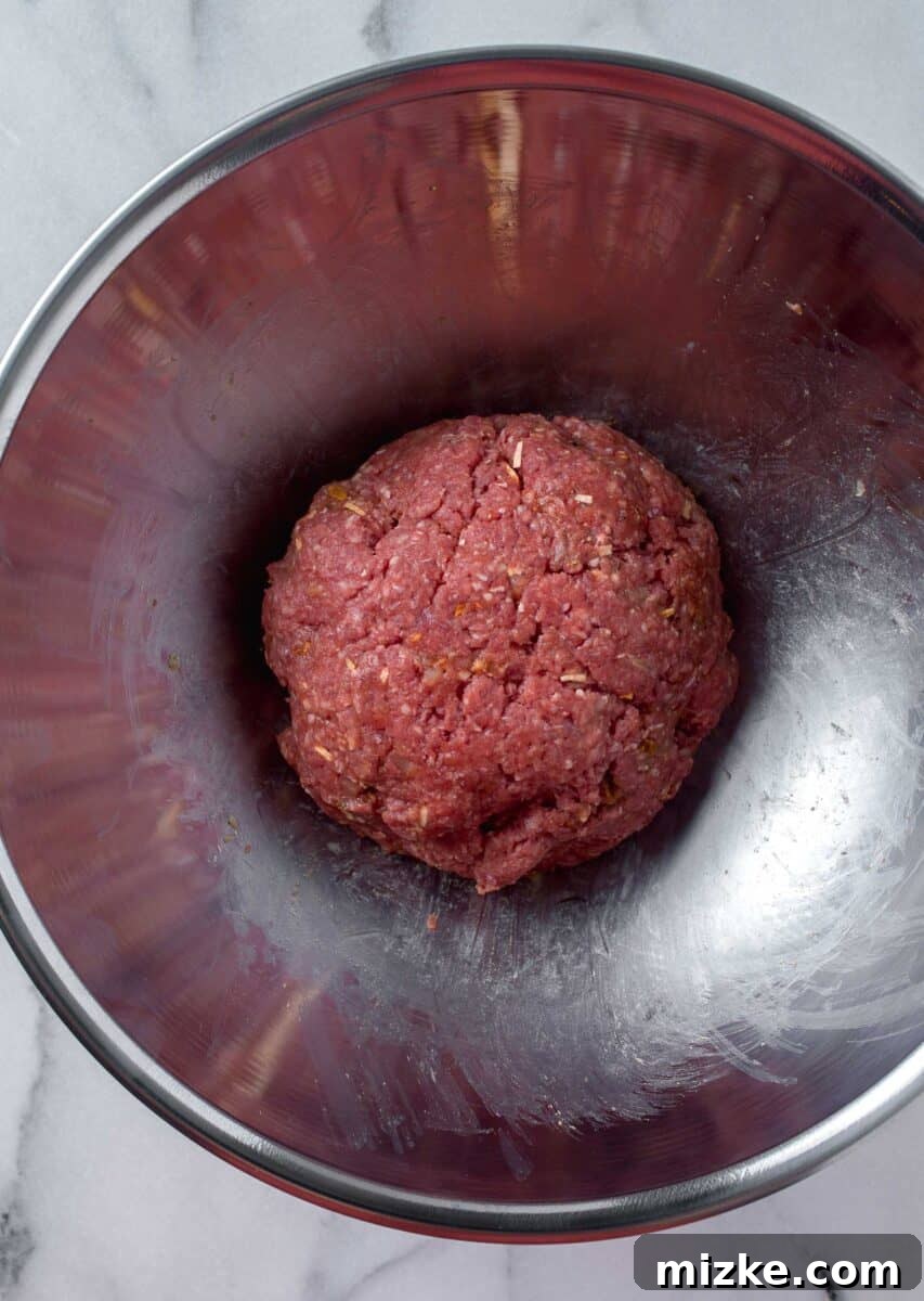 Golden State Delight 6 beef mixture mixed up in a metal bowl