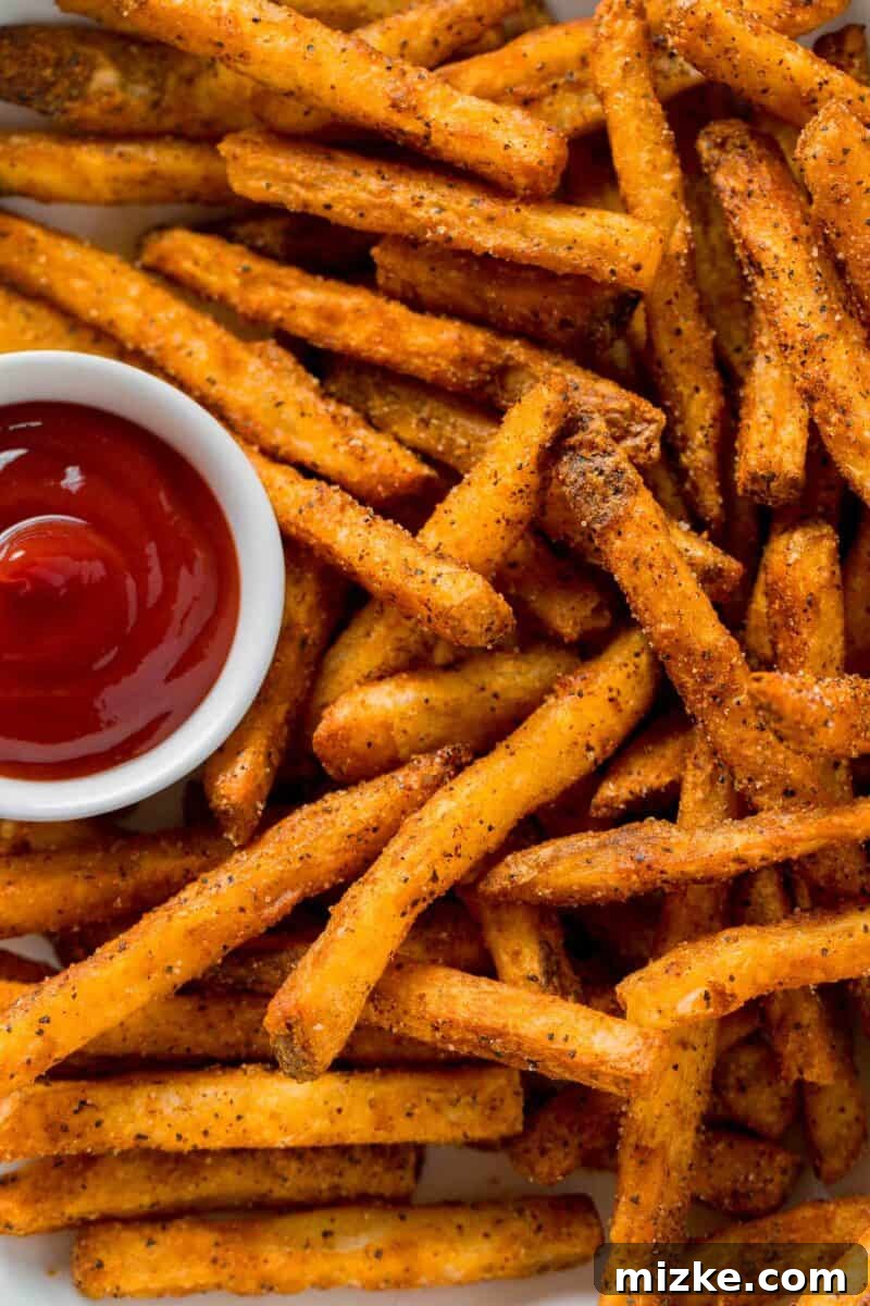 Louisiana Kick Fries 3 crispy, perfectly fried cajun fries and ketchup