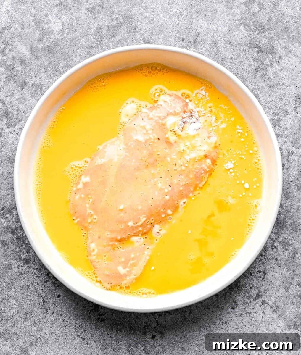 This easy chicken francese is made of tender chicken breast halves lightly breaded, pan-fried, and finished in a bright lemon-butter sauce. Dredging both sides of a chicken breast half in an egg mixture.