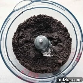 Crushed Oreos with melted butter in a food processor