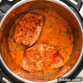 Perfectly Tender Instant Pot Pork Chops 15 Seared pork chops added back to the liquid in the Instant Pot
