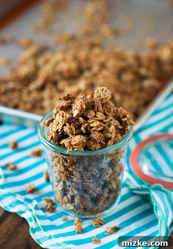 Crunchy Peanut Butter Granola Clusters Close-up of crunchy peanut butter granola clusters on a baking sheet