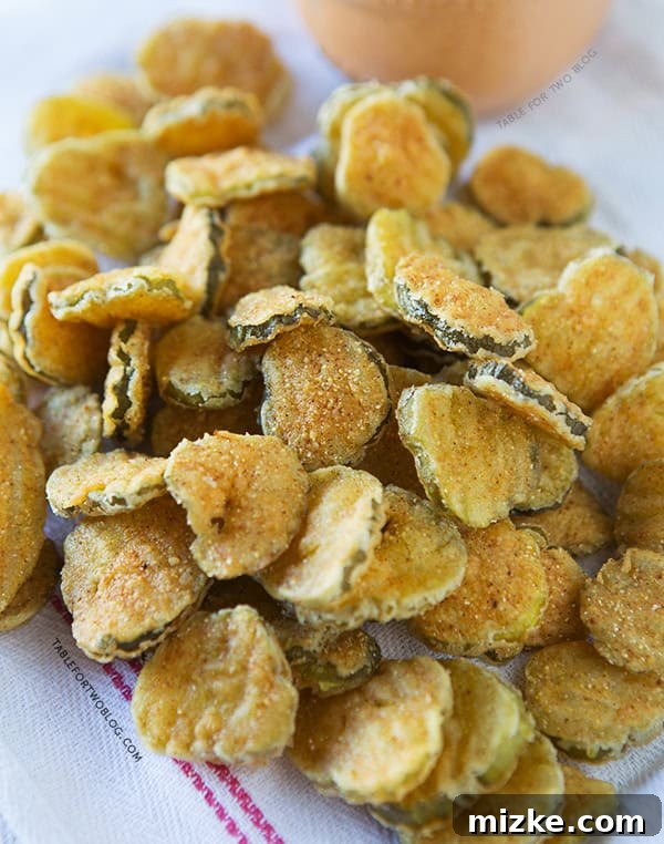 Classic Deep-Fried Pickles | tablefortwoblog.com Crispy Fried Pickles served as an appetizer