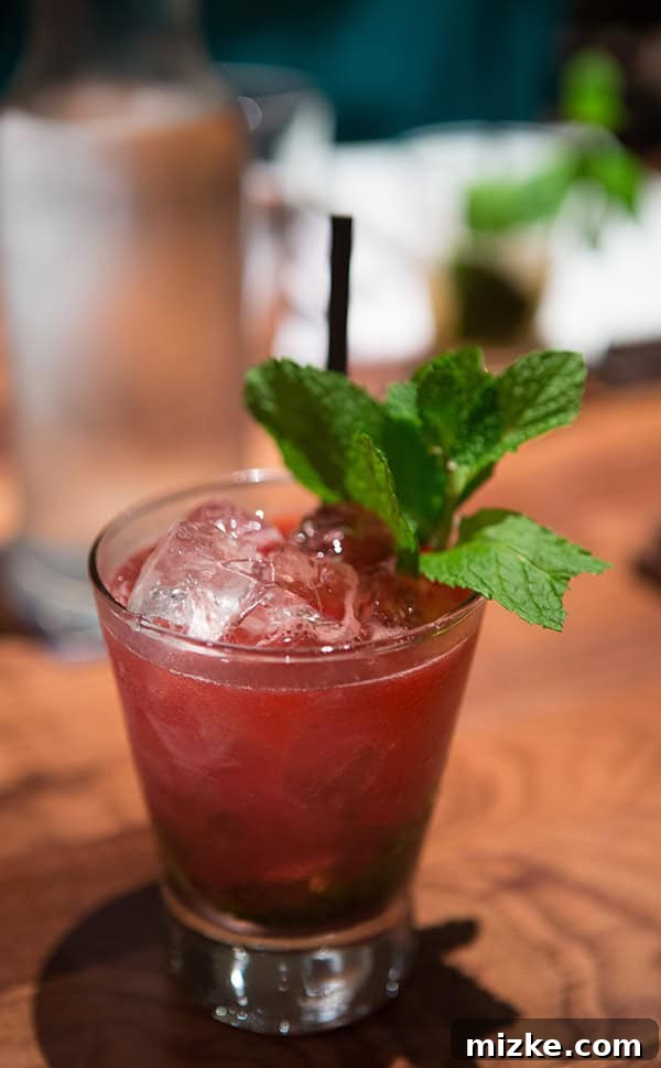 Feasting Through Music City 26 Beautifully crafted Mason jar cocktails and appetizers on a set table at Mason's