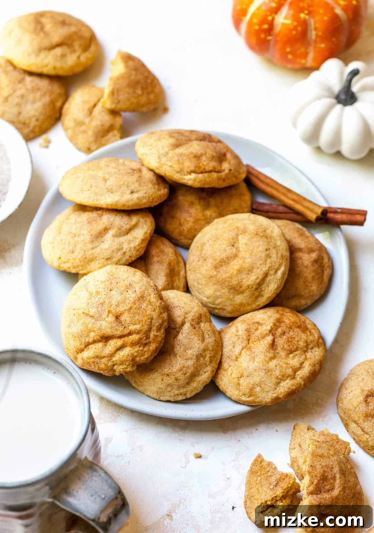 Harvest Pumpkin Spice Snickerdoodles 2 Soft and chewy pumpkin spice snickerdoodles arranged beautifully for a Fall dessert spread.