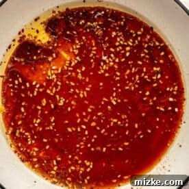 general tso's sauce in a large cast iron skillet