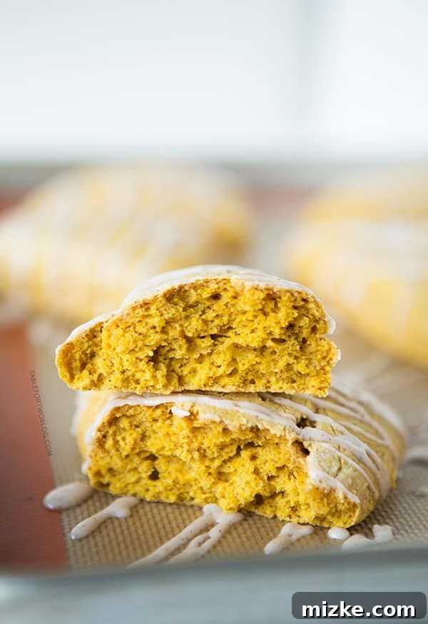 Starbucks Copycat Pumpkin Scones | tablefortwoblog.com Freshly baked Starbucks Copycat Pumpkin Scones cooling on a wire rack, ready for icing