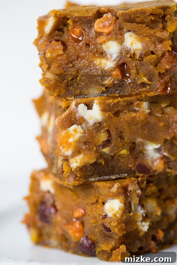 Close-up of a stack of Pumpkin Blondies | tablefortwoblog.com