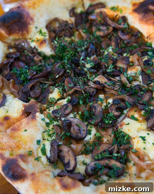 Another delectable pizza option at Bar Bocce. A delicious caramelized onion, fontina, and mushroom pizza.