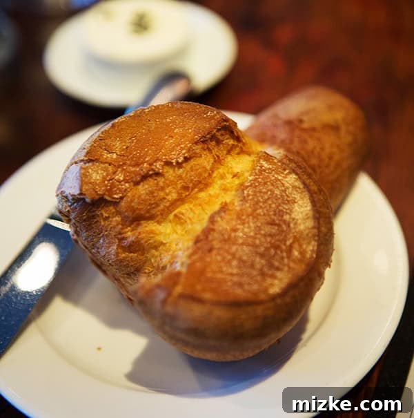 Complimentary popovers at Wayfare Tavern, a delightful start. Freshly baked, golden popovers served with special butter and black salt.
