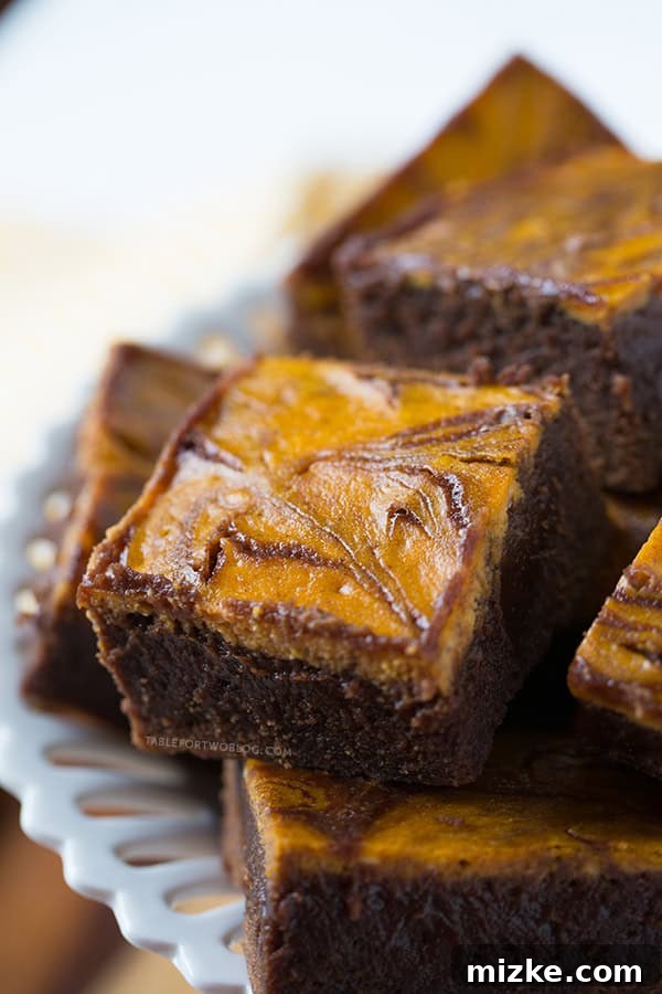 Pumpkin Cheesecake Swirl Brownies | tablefortwoblog.com Moist Pumpkin Cheesecake Swirl Brownies - Top View
